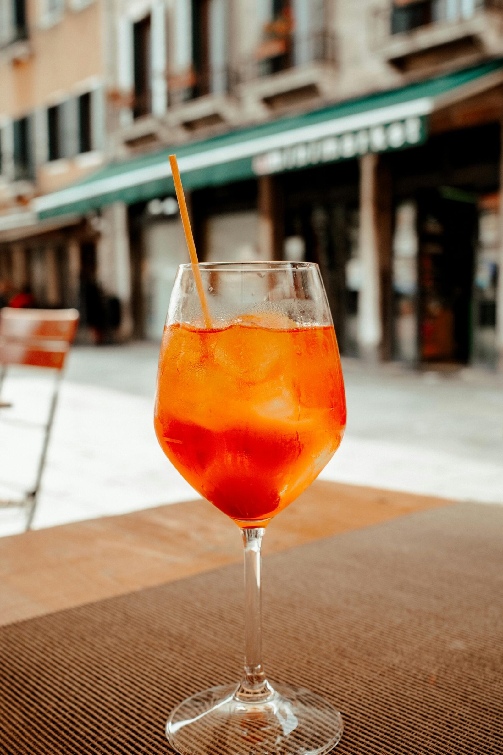 Chilled Aperol Spritz on a table in Venice, Italy. Perfect for a sunny day.