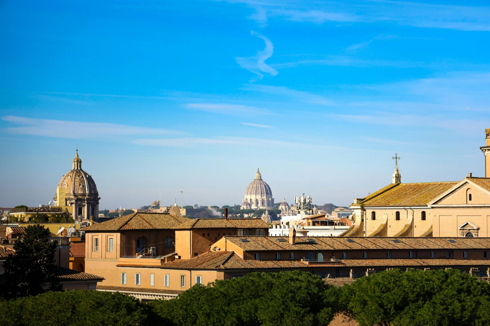 Rome rooftop event space hosting a phygital corporate gathering, blending physical networking with digital insights and panoramic city views.